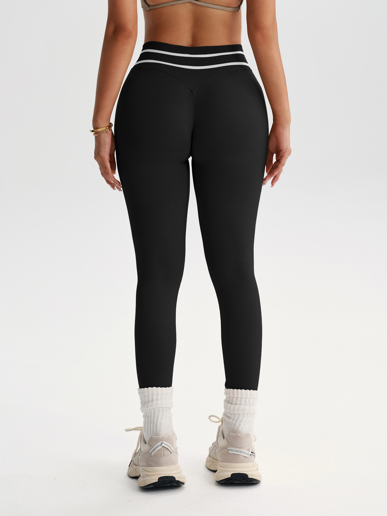 Black v-back sport leggings, back view